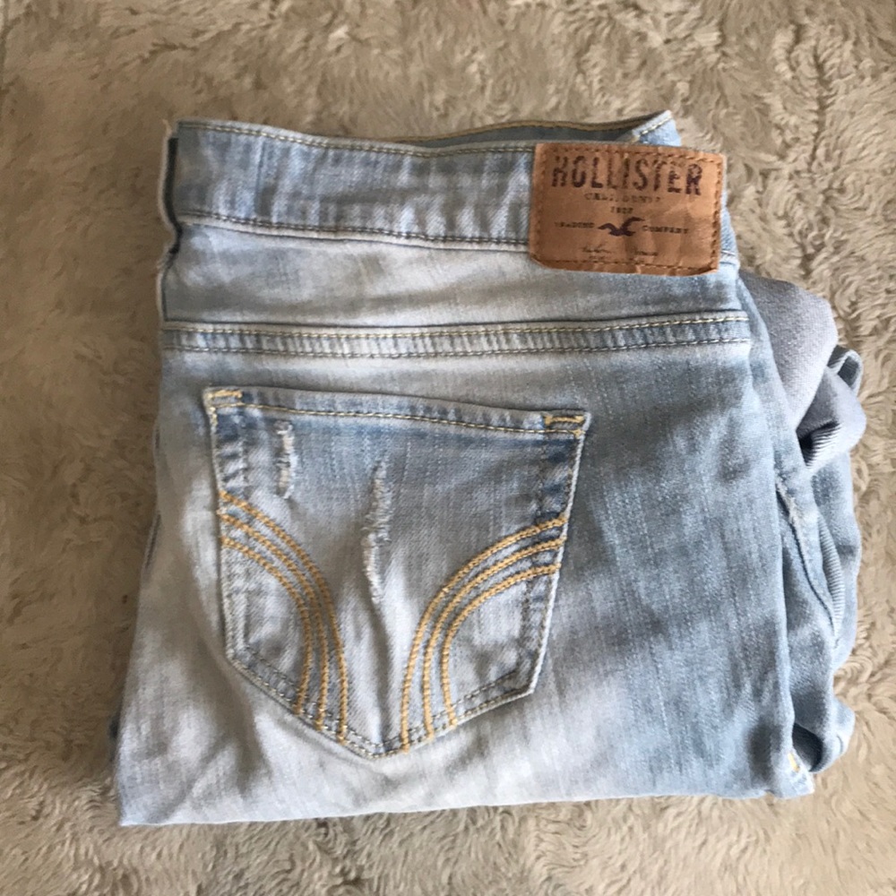 Hollister light-wash ripped bootcut jeans.